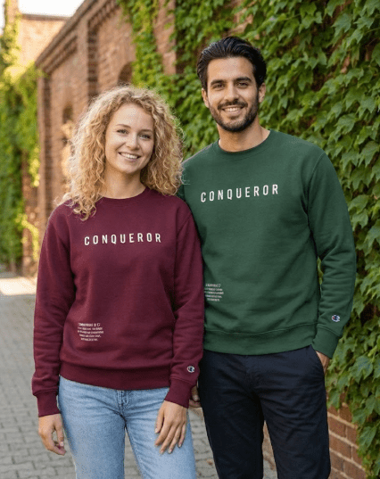 Men and women wearing Conqueror Christian sweatshirts