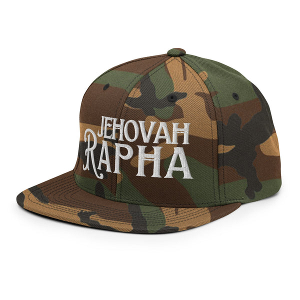 Front view of camo Jehovah Rapha God My Healer trucker hat