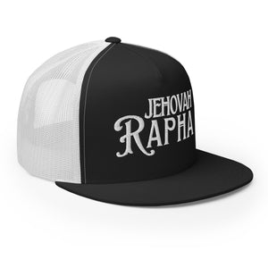 Black and white Jehovah Rapha embroidered flat bill trucker hat worn by model angled view