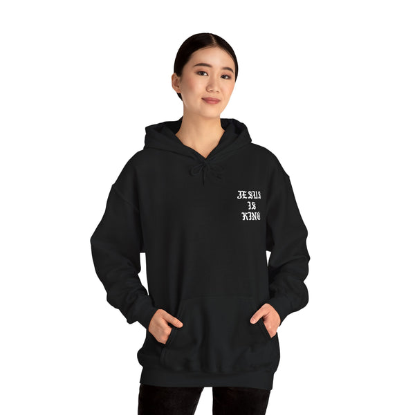 Model wearing black Jesus Is King hoodie front view