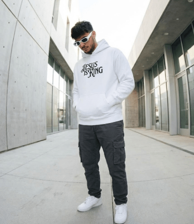 Full body view of white Jesus Is King Christian hoodie