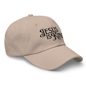 Angled view of tan Jesus Is King women’s dad hat