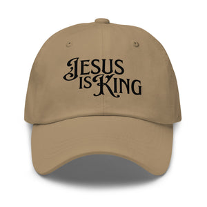 Front view of tan Jesus Is King women’s dad hat