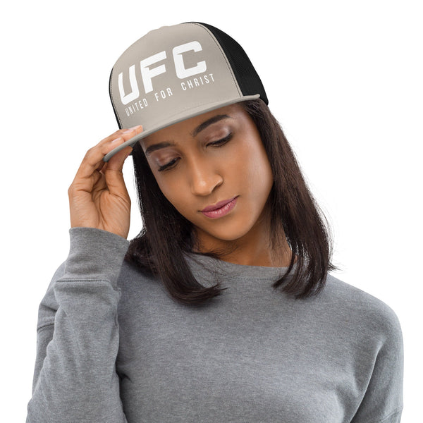 Woman wearing grey UFC United for Christ trucker cap